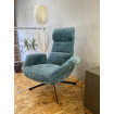 Blue velvet wivel armchair